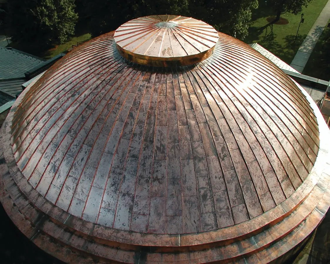 Craftsman Roofing crew installing a new roof in North Bellport